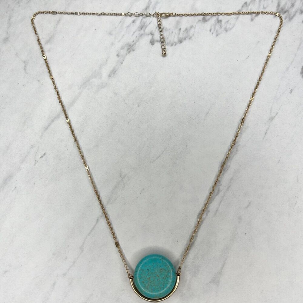 Gold Tone Faux Turquoise Spinning Pendant Necklace